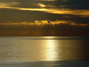 free-sunset-over-the-ocean_Google-Slides-theme